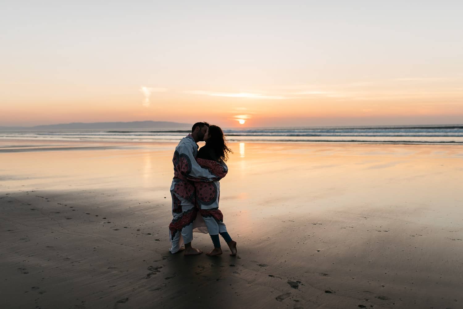 couple kissing at sunset Couples Session Photographers