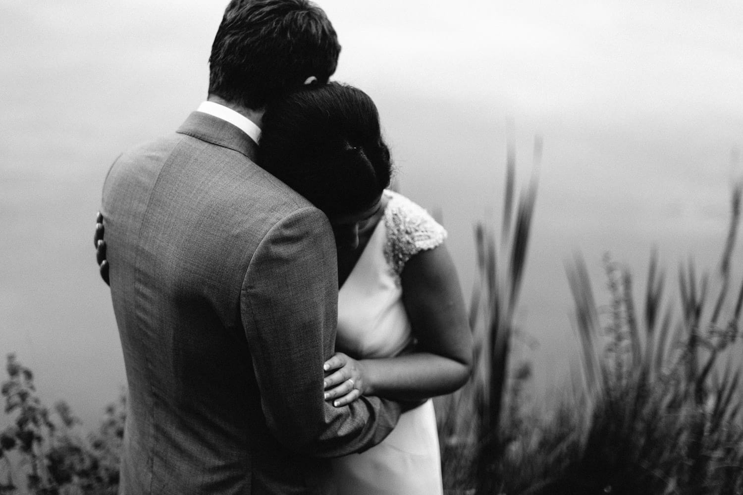 bride and groom embrace Lissanoure Castle Wedding Photography black and white