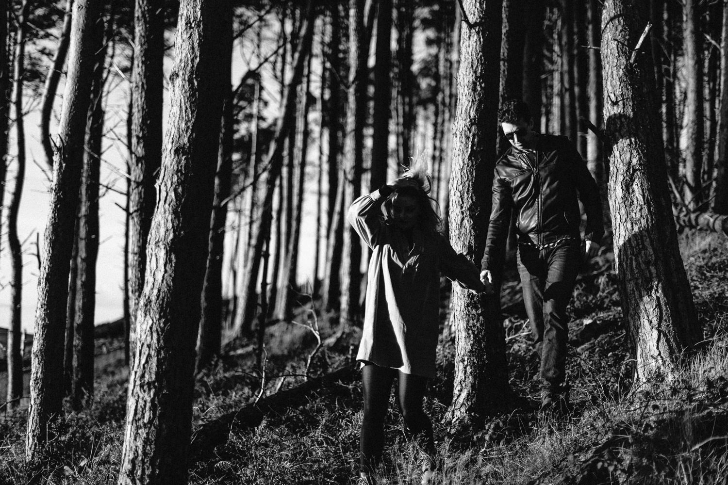 couple walking through the forest black and white Mourne Mountains Engagement Photos