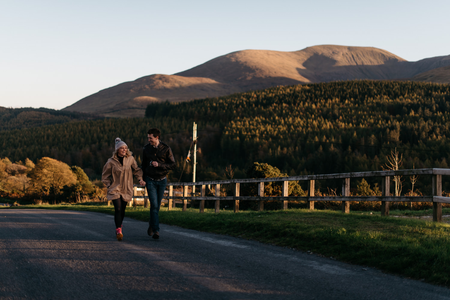 couple running holding hands Mourne Mountains Engagement Photography