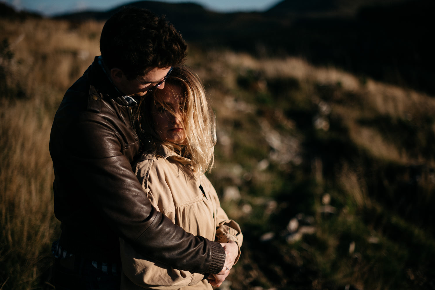 couple hugging at sunset Mourne Mountains Engagement Photography
