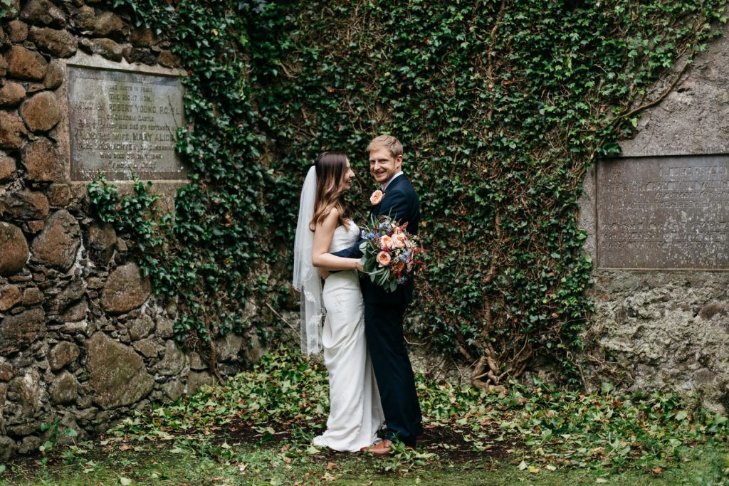 bride and groom hugging in chapel ruins Ivory Pavilion Wedding photography