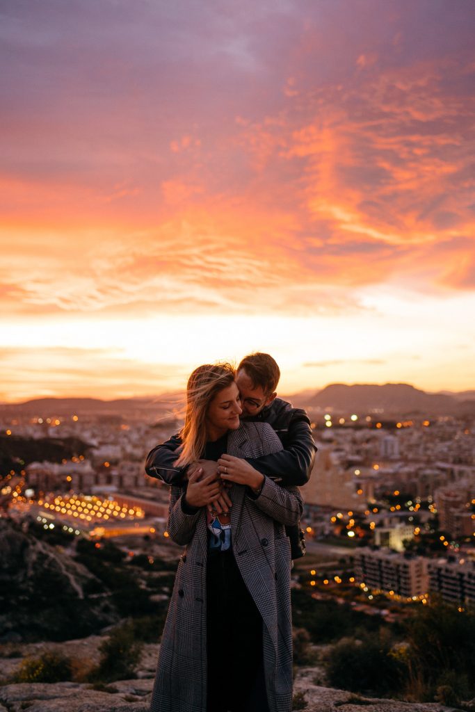 couple hugging at sunset couple hugging and laughing at sunset Wedding Photography Barcelona