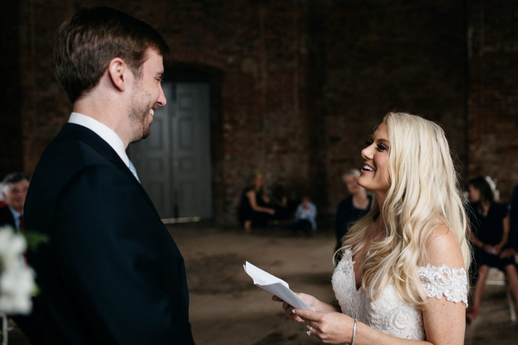 couple exchange vows at Mussenden temple Northern Ireland Elopement Photographers