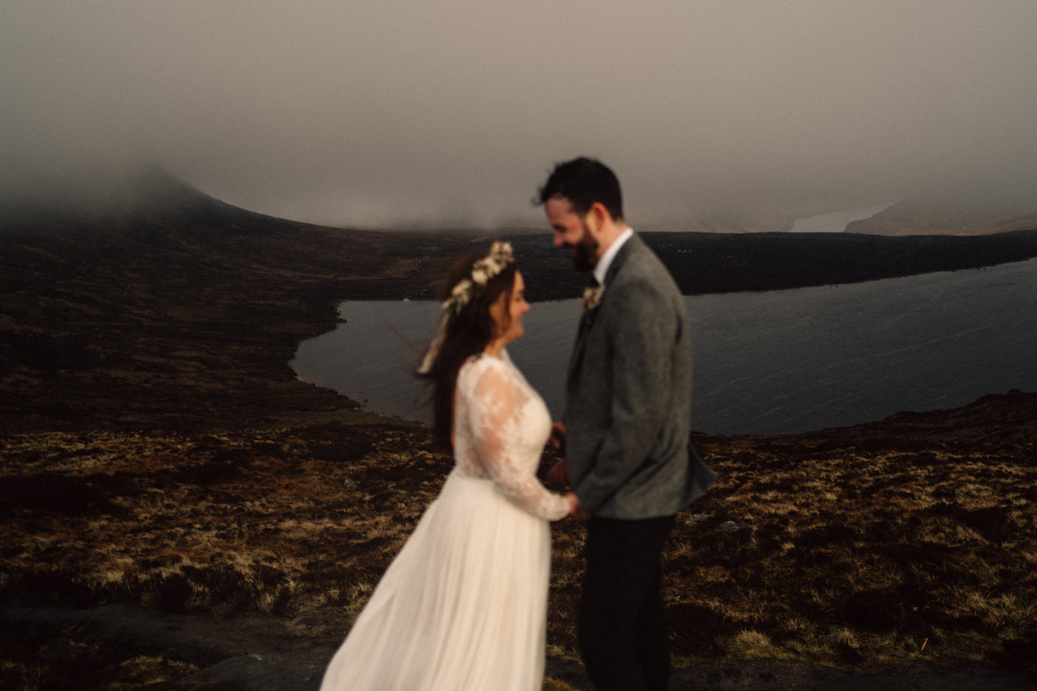 bride and groom holding hand Mourne wedding photographer mourn mountains 