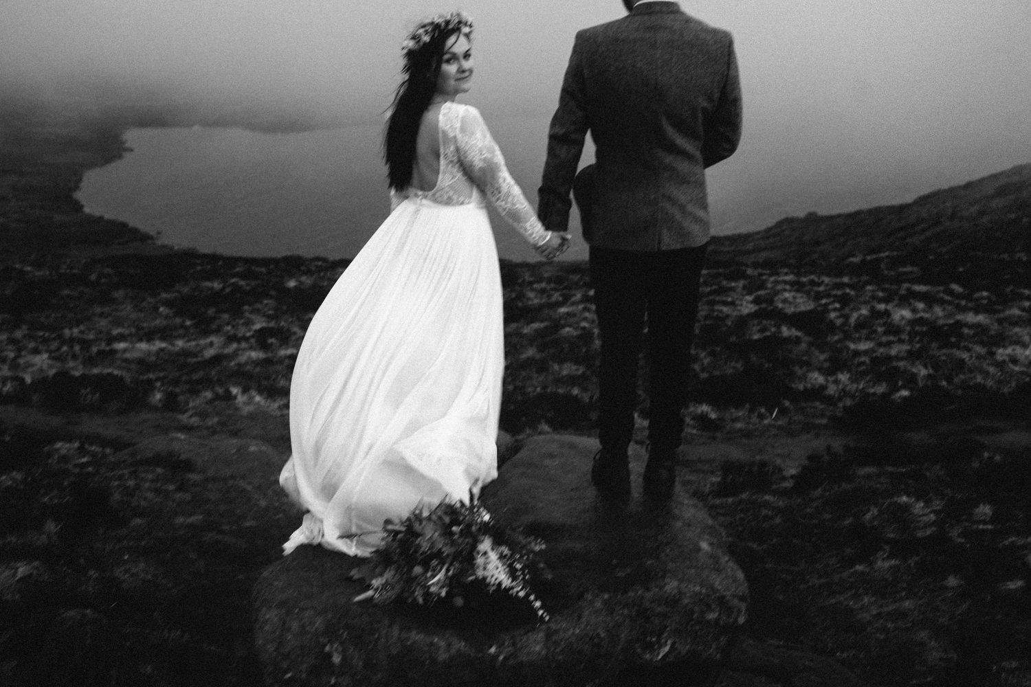 bride looking back at camera black and white Mourne Mountains Wedding Photography