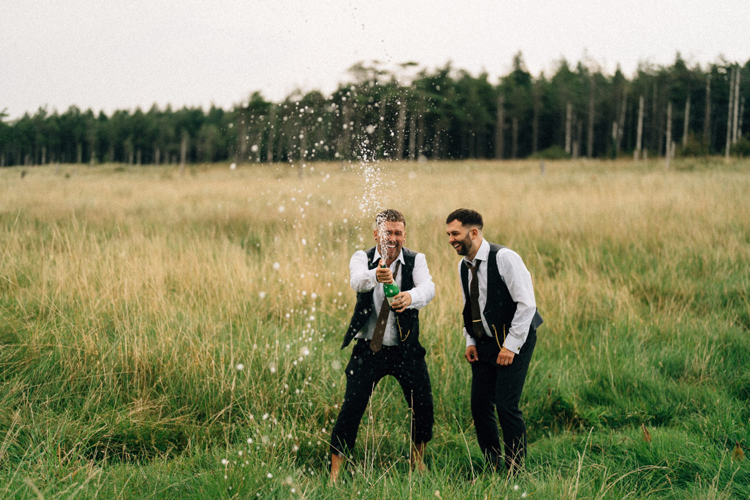 grooms posing champaign LGBT wedding wedding photographers northern ireland