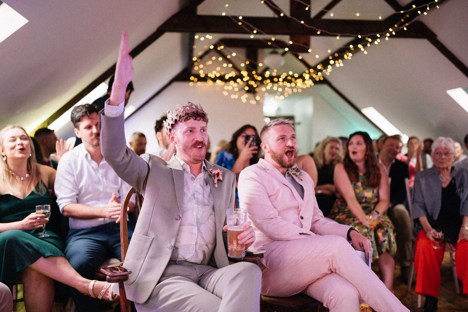 grooms laughing at gay wedding camp cabaret 