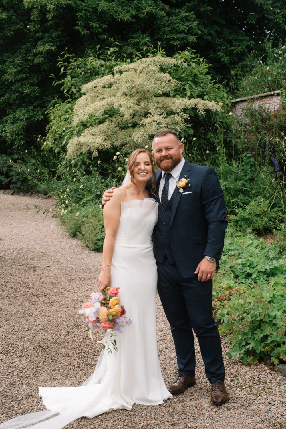 groom with arm around bride in Larchfield Larchfield Estate Wedding Photos